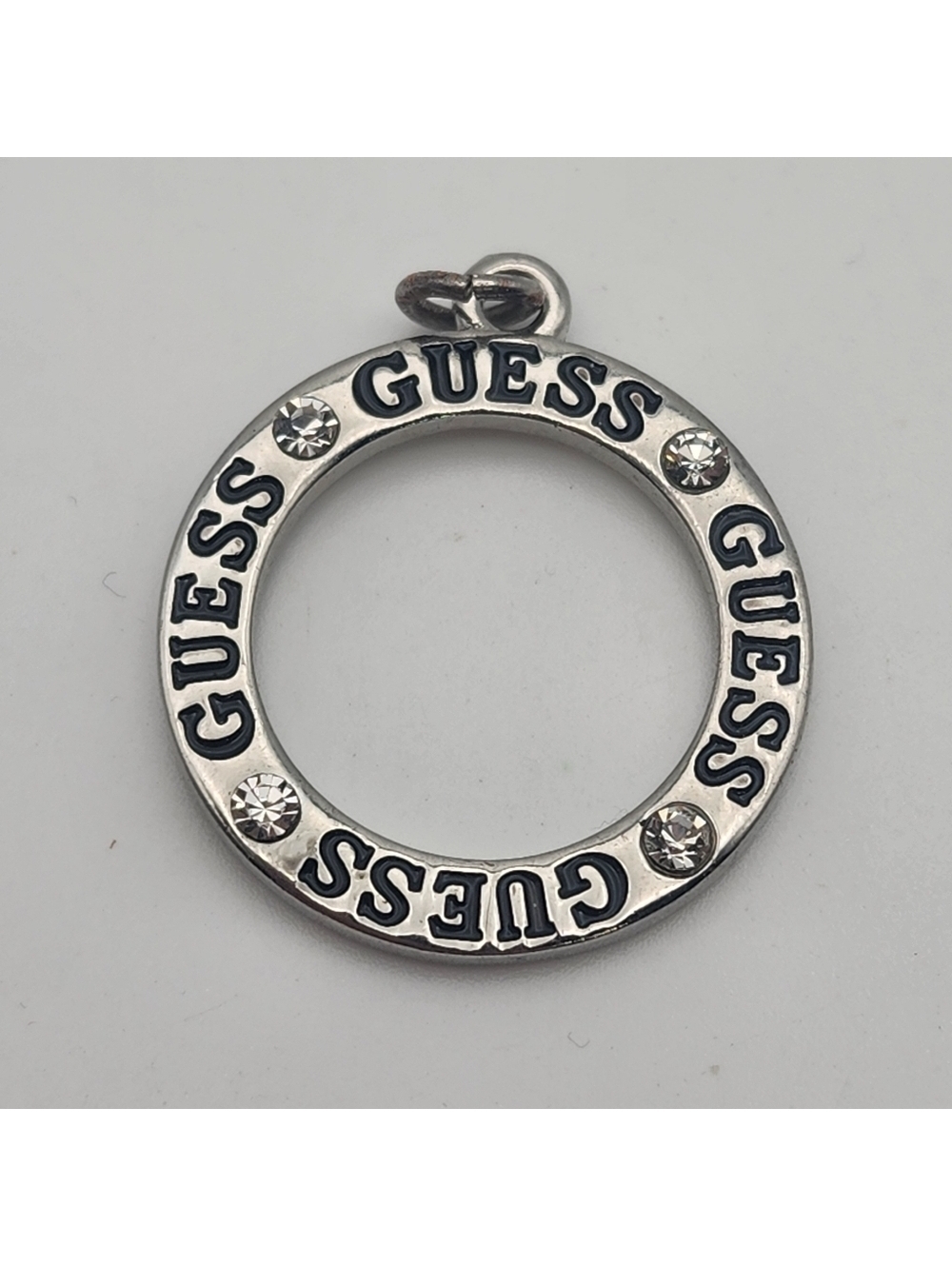 Guess Silver Tone Circle Pendant with Clear Rhinestones